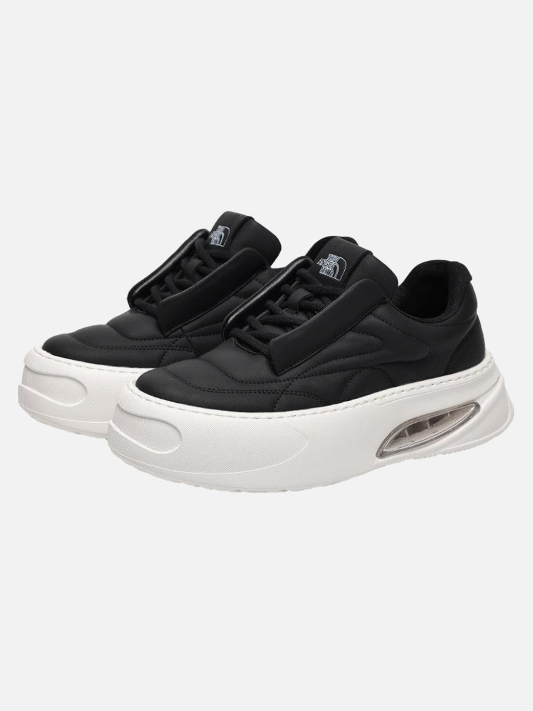 TALISHKO black retro platform skate shoes with quilted design, perfect for urban street style.