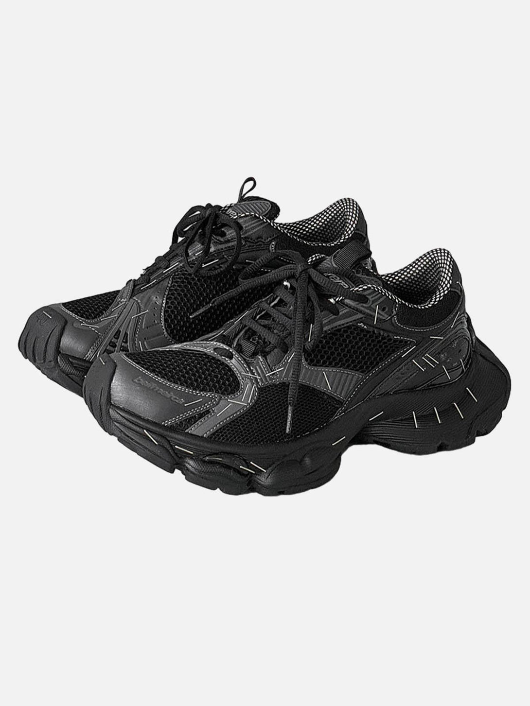 Black chunky sneakers by TALISHKO, showcasing a retro design and front view style.