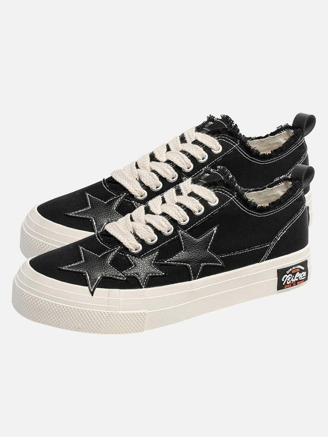 TALISHKO black canvas shoes with retro star accents and textured white laces, perfect for casual style.
