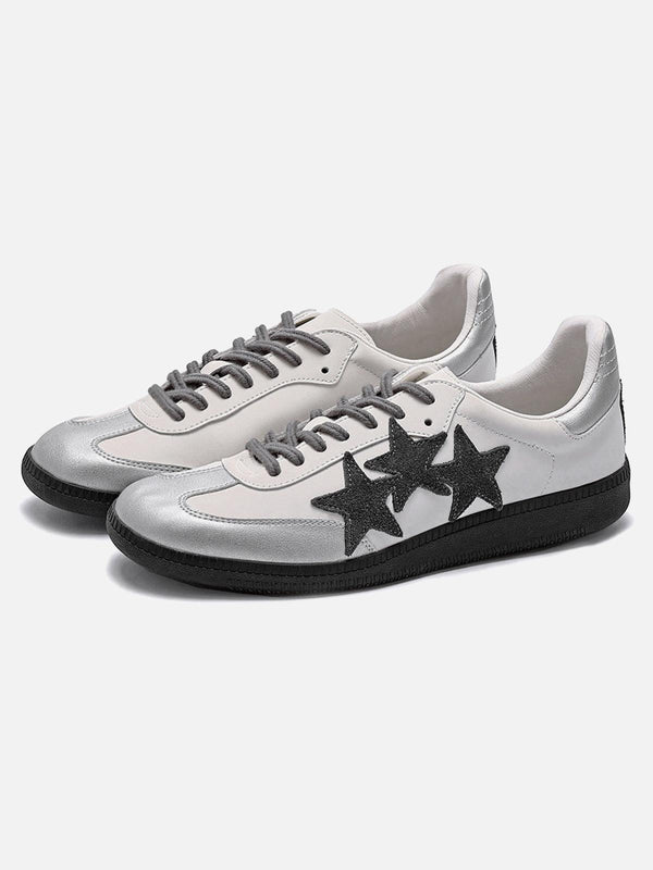Silver retro suede star sports shoes by TALISHKO, showcasing stylish front design details.