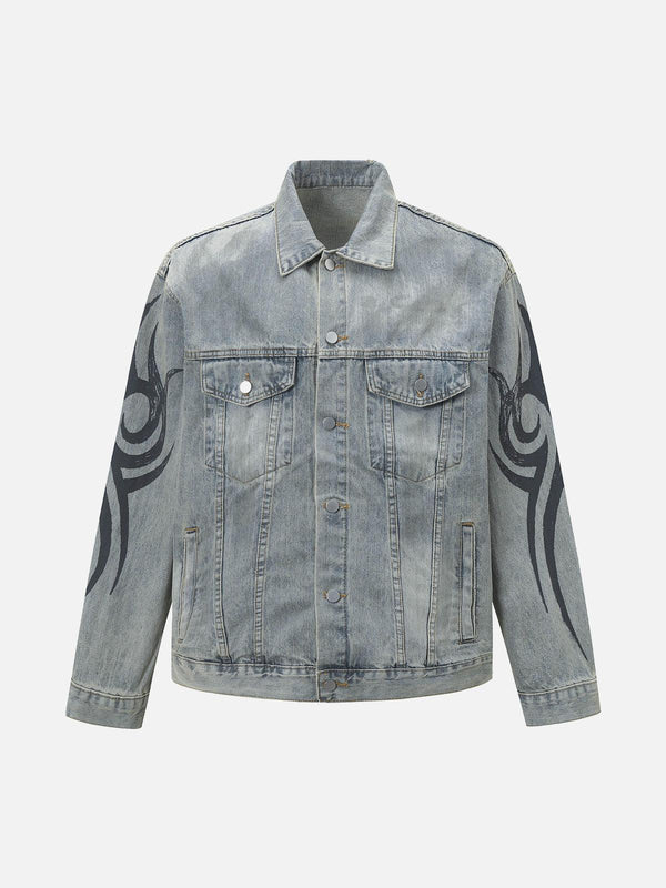 Front view of a blue denim jacket with tribal designs on sleeves by TALISHKO, ideal for urban style.