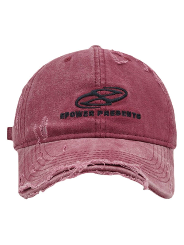Front view of a red ripped denim baseball cap by TALISHKO, featuring a casual street style.