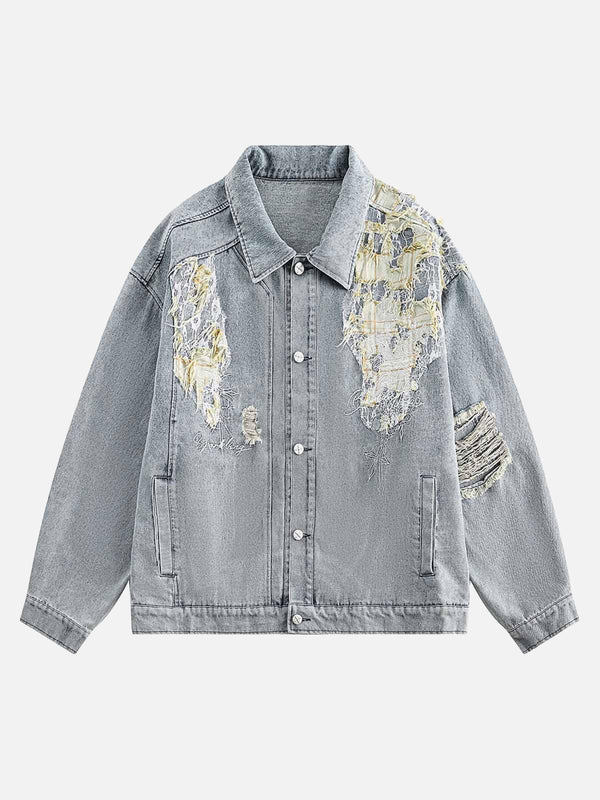 Front view of a light blue ripped denim jacket with lace panel detailing by TALISHKO.