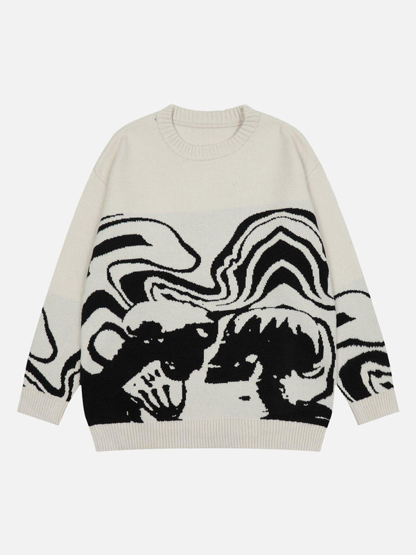 Front view of a beige TALISHKO sweater featuring an abstract black and white design.