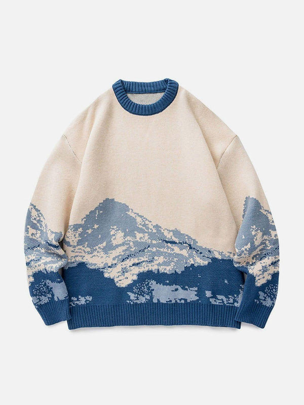 Front view of TALISHKO's blue knit sweater featuring a snow mountain gradient design.
