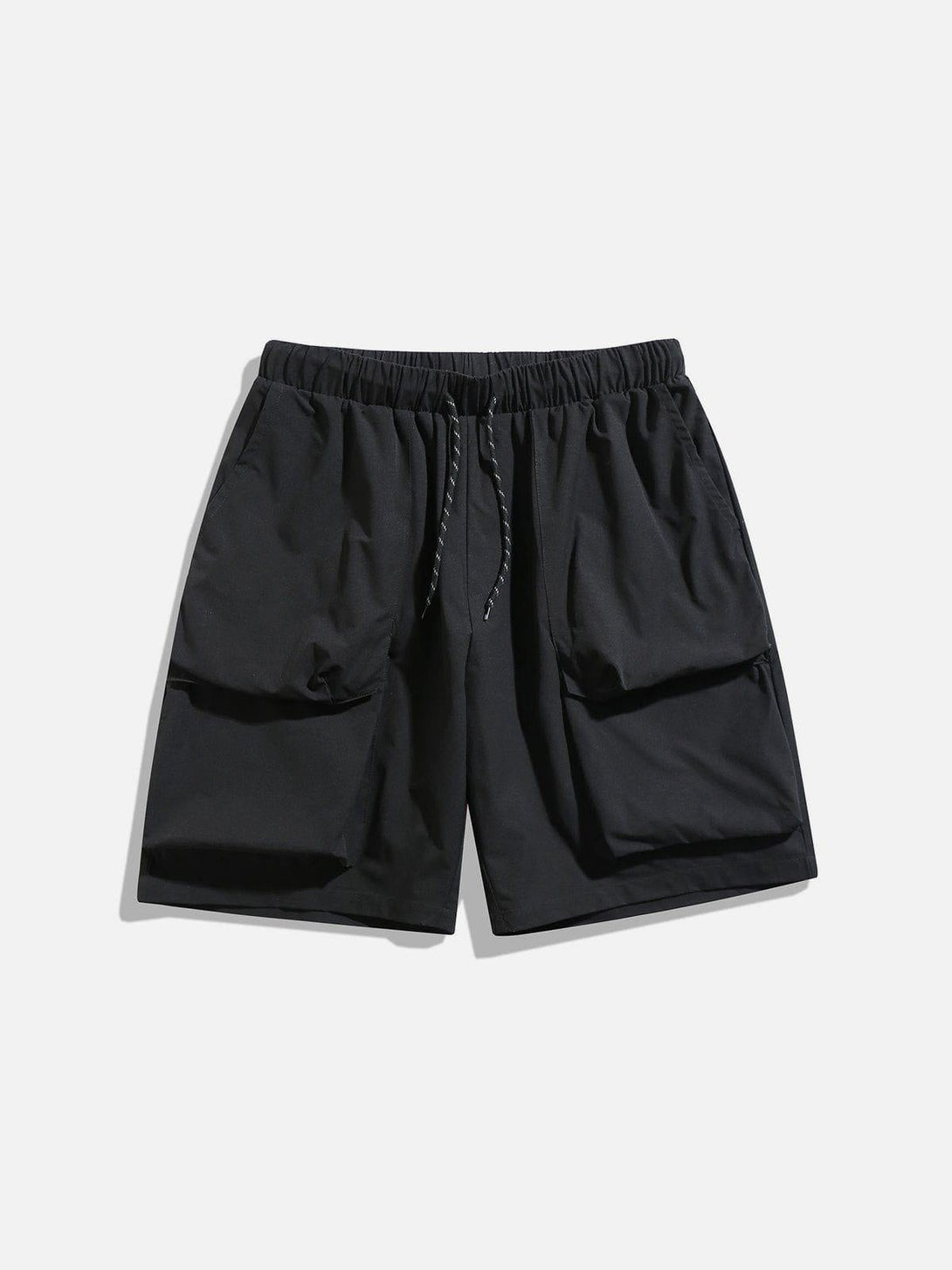 Front view of black drawstring shorts by TALISHKO, featuring roomy pockets for a relaxed look.
