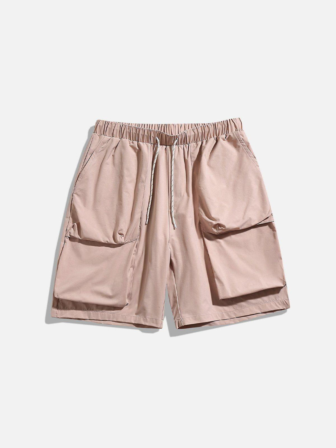 Front view of pink drawstring shorts by TALISHKO, featuring large pockets for casual wear.