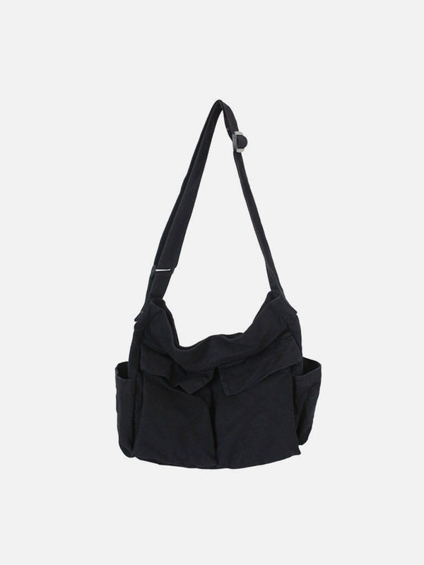 Black shoulder bag with large pockets by TALISHKO, showcasing a casual streetwear vibe.