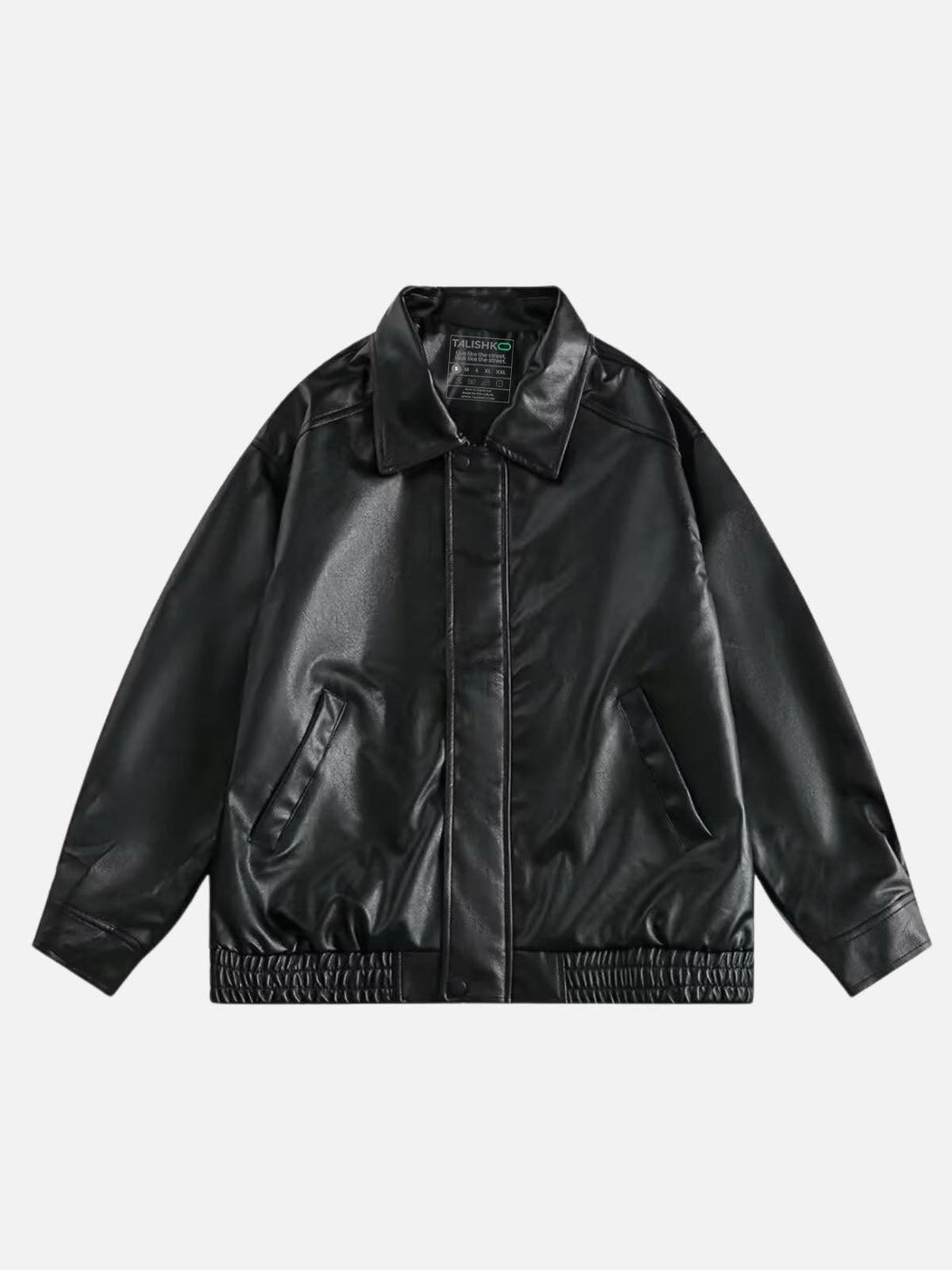 Front view of a black faux leather jacket by TALISHKO, showcasing its sleek street style.