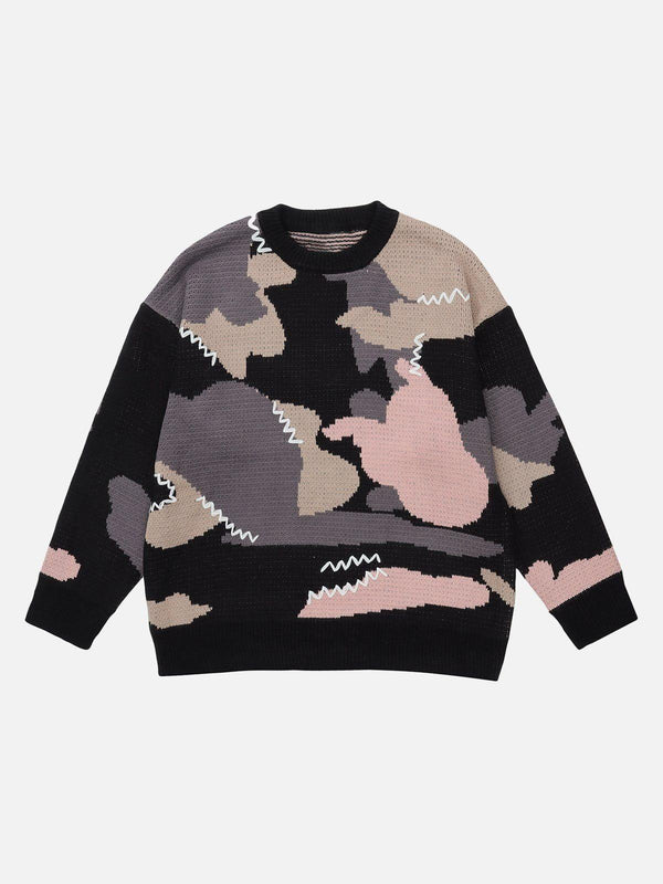 Front view of a TALISHKO sweater in black with abstract splicing design, perfect for trendy outfits.