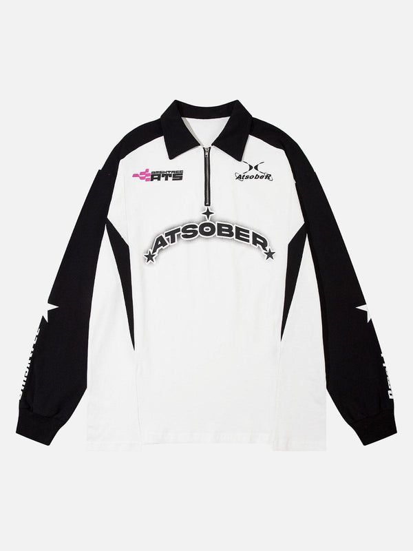 Front view of a white and black long sleeve quarter zipper shirt by TALISHKO, featuring star accents.