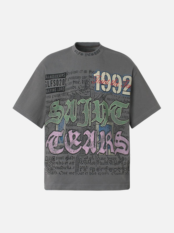 Front view of a gray graphic T-shirt featuring bold designs by TALISHKO, perfect for casual looks.