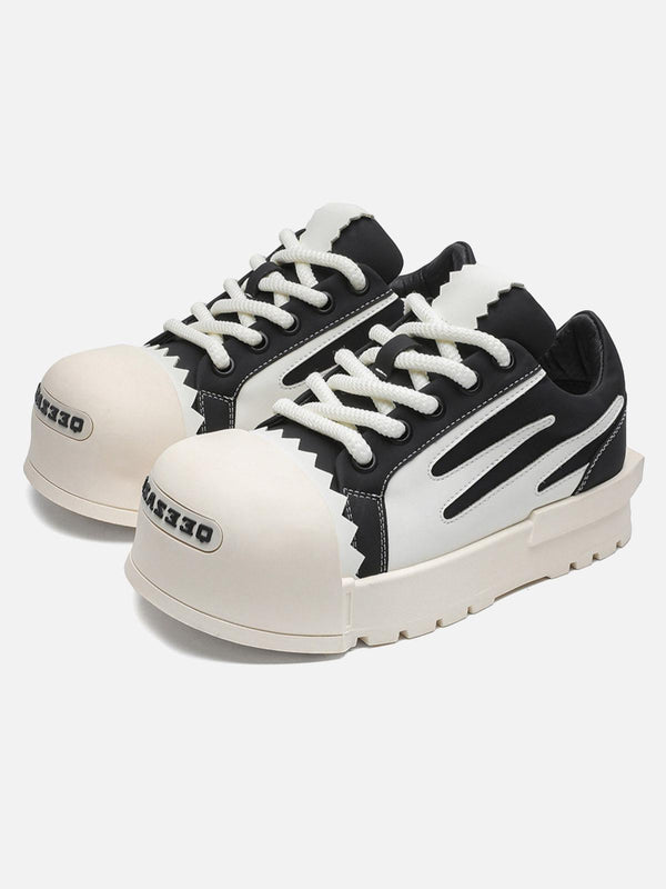 Front view of TALISHKO black casual sneakers with contrast details and unique design elements.