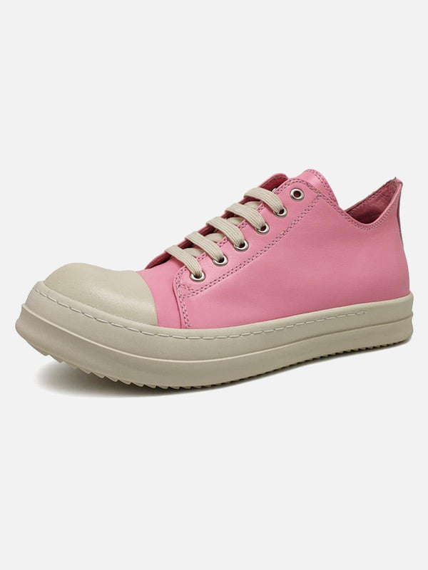 TALISHKO pink leather low-top sneakers showcasing a stylish front view with beige accents.