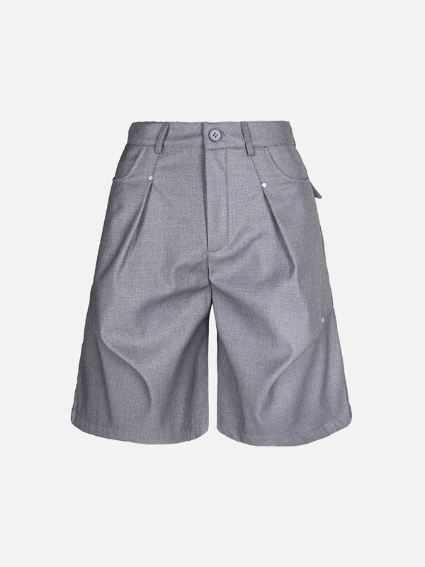 Front view of gray pleated shorts by TALISHKO, featuring rivet details and a retro style.