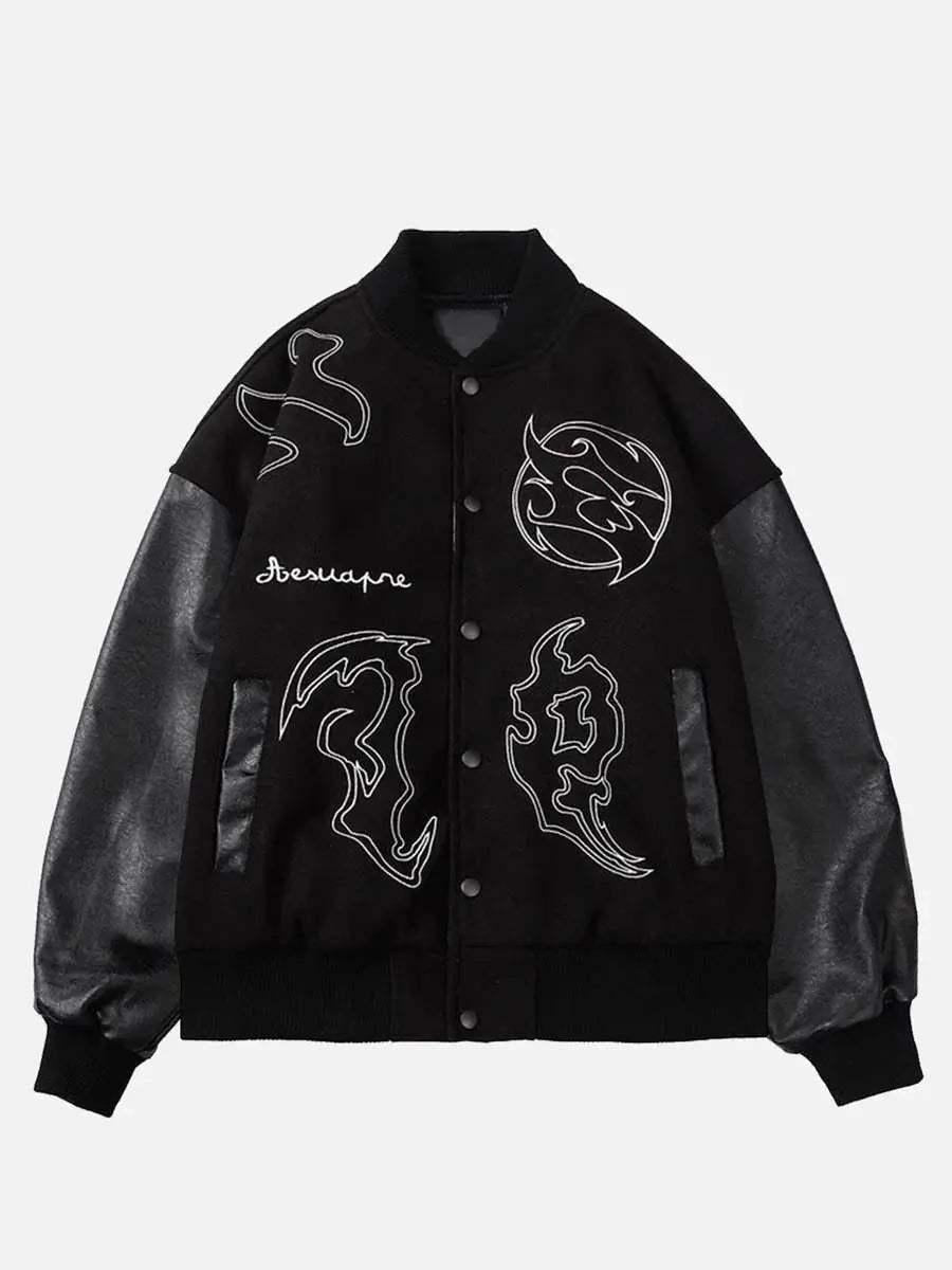 Front view of a black racing jacket with symbolic embroidery and PU leather sleeves by TALISHKO.