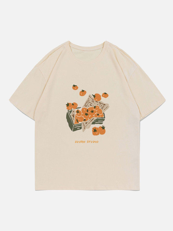 Apricot tee by TALISHKO featuring a playful tomato print, shown in a front view.