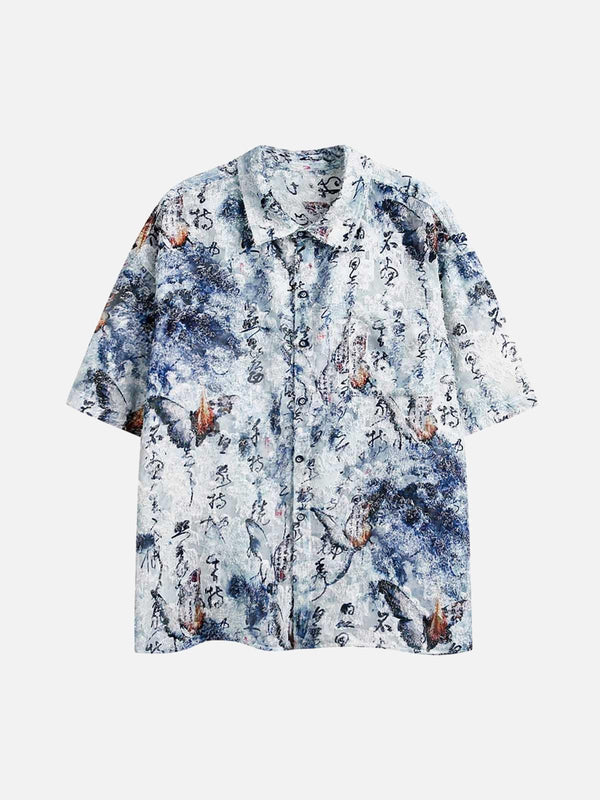 Front view of a blue short-sleeve shirt featuring traditional calligraphy print by TALISHKO.