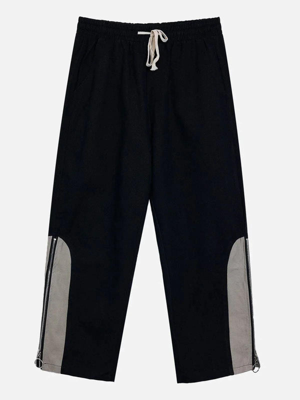 Front view of trendy black zipper straight-leg pants by TALISHKO, ideal for urban style.