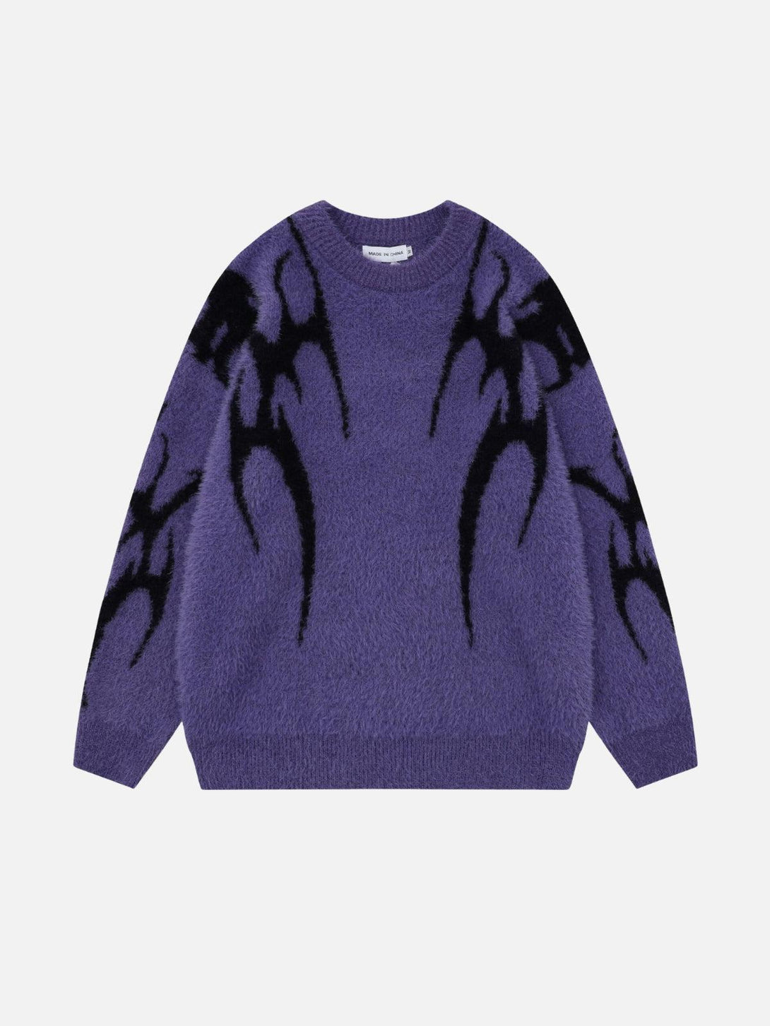 Front view of a purple tribal jacquard knit sweater by TALISHKO, featuring bold black patterns.