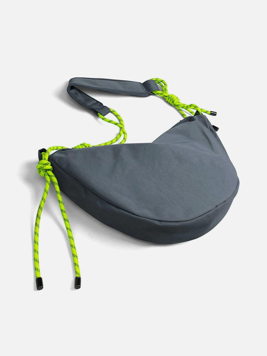 Gray dumpling-shaped crossbody bag by TALISHKO, featuring neon rope details for urban style.