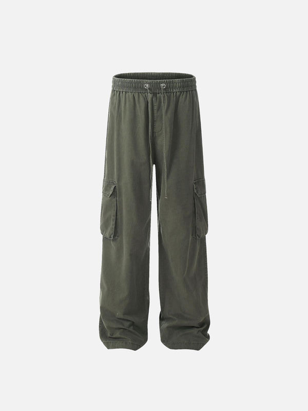 Front view of green vintage washed cargo pants by TALISHKO, featuring multiple pockets.