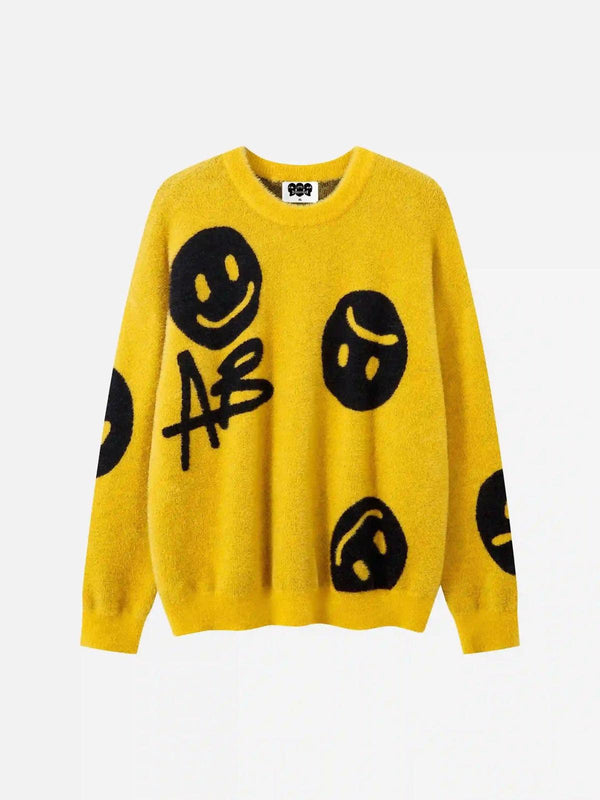 Front view of a yellow TALISHKO sweater with playful smiley face graphics for a bold look.