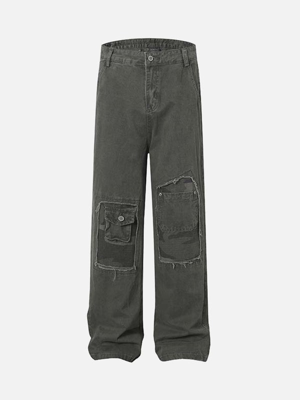 Front view of dark gray vintage distressed cargo pants by TALISHKO, featuring unique pocket details.
