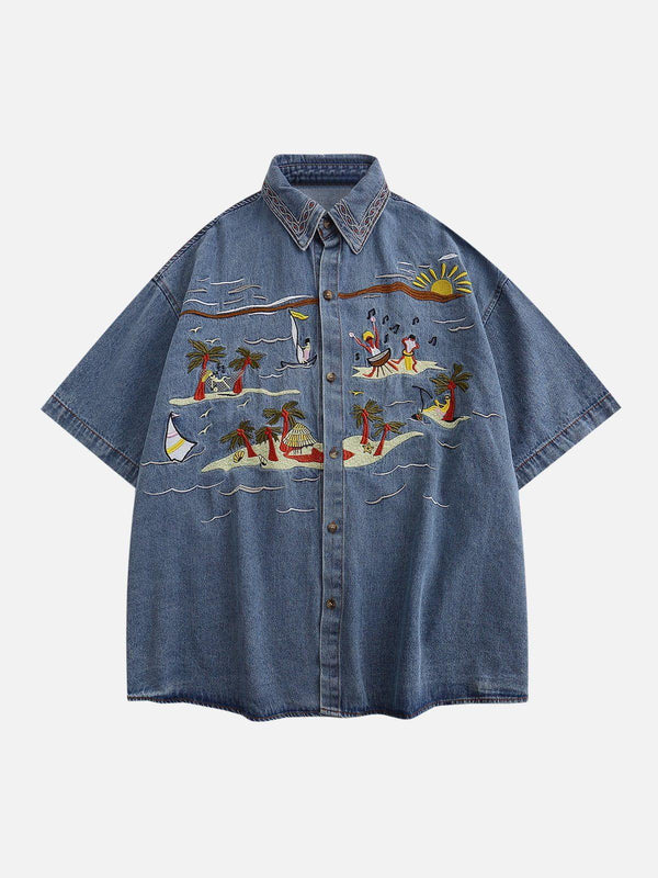Front view of a blue vintage embroidered denim shirt by TALISHKO, featuring a beach scene design.