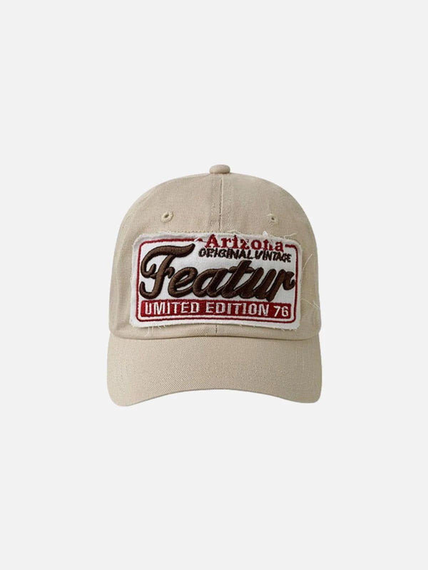 Khaki vintage embroidery letter cap by TALISHKO, showcasing a unique front patch design.