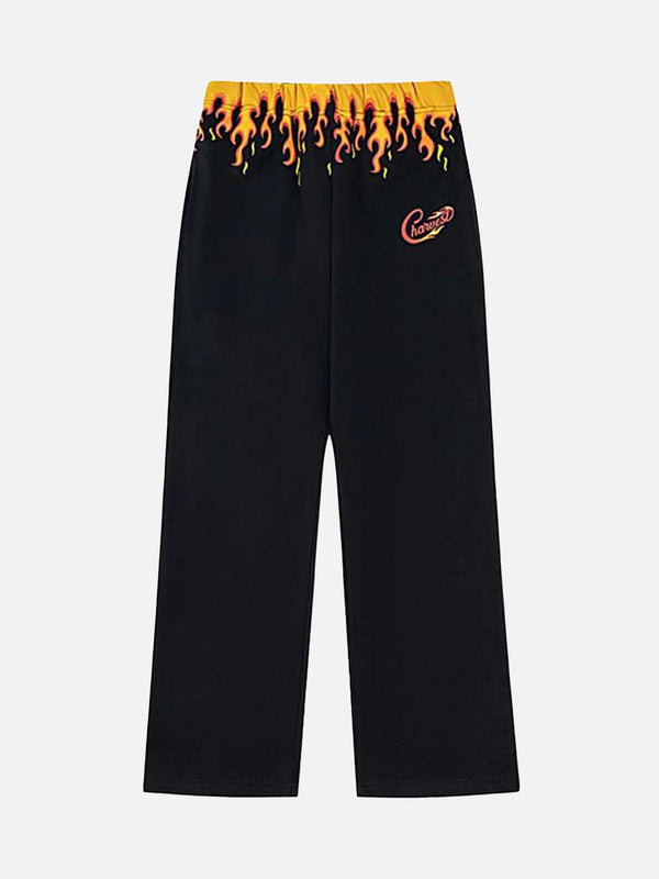 TALISHKO black sweatpants with flame print detail, showcasing a bold street-style design.