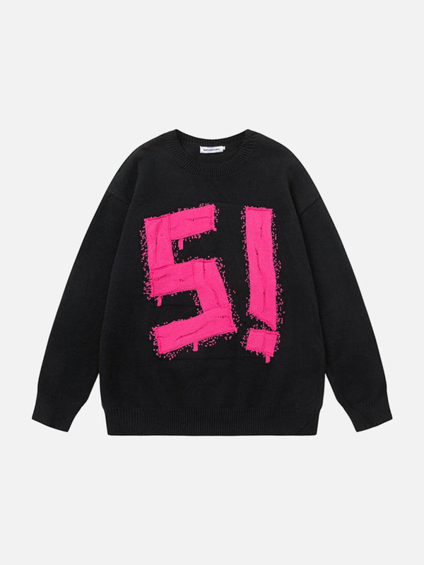 Front view of a black sweater by TALISHKO featuring bold pink graffiti-style embroidery.
