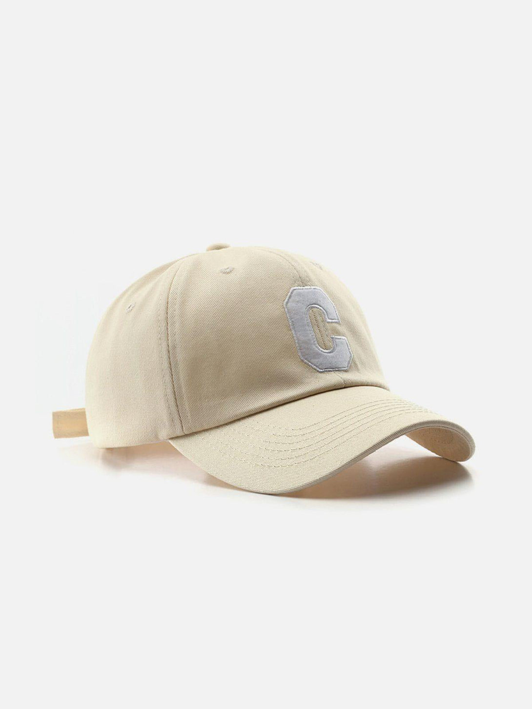 Front view of an apricot white baseball cap with a bold "C" by TALISHKO, perfect for casual wear.