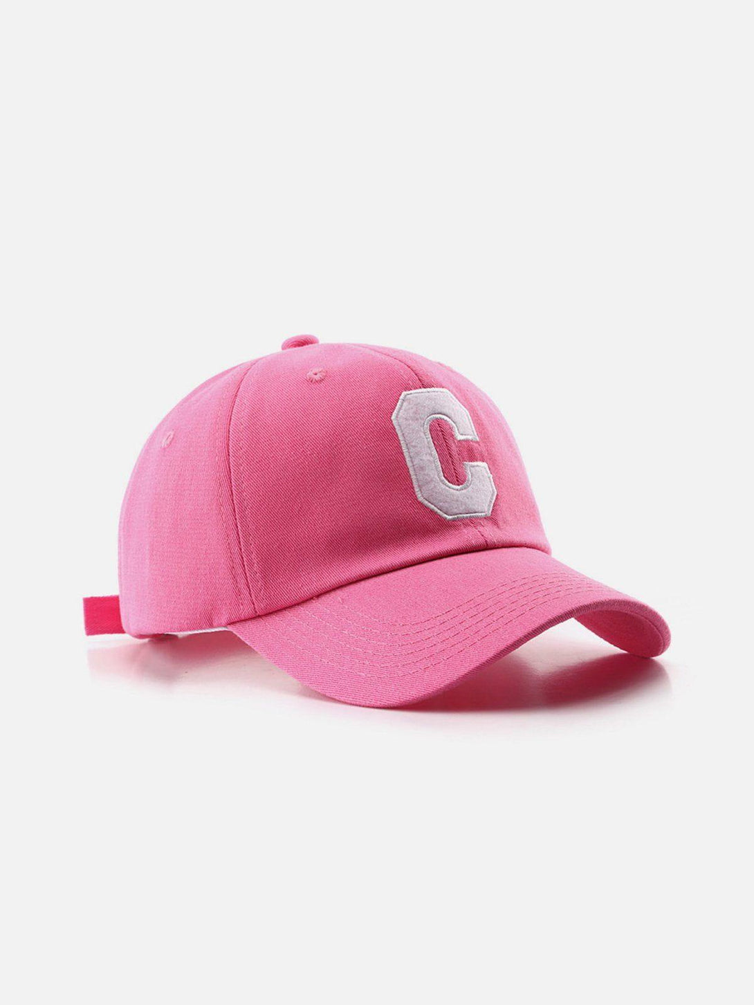 Front view of a pink baseball cap with a white "C" by TALISHKO, adding a playful touch.