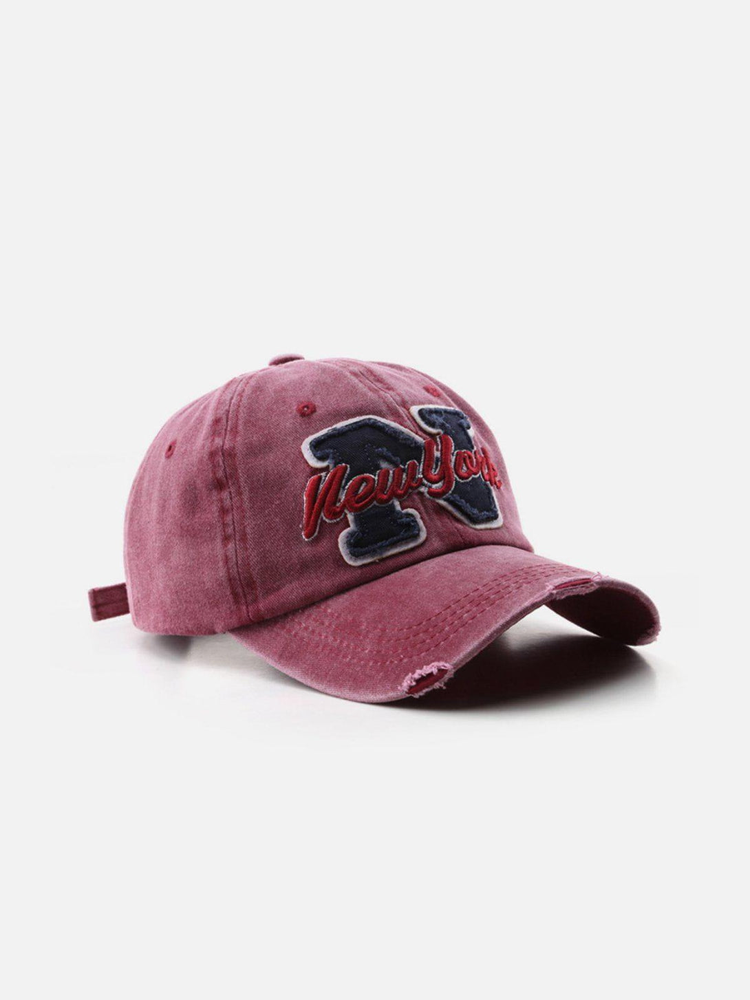 Red vintage-style baseball cap with "New York" embroidery, front view by TALISHKO.
