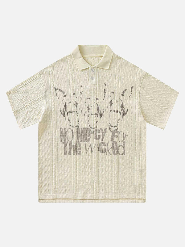 Front view of apricot polo shirt by TALISHKO, featuring a vintage graphic and textured design.