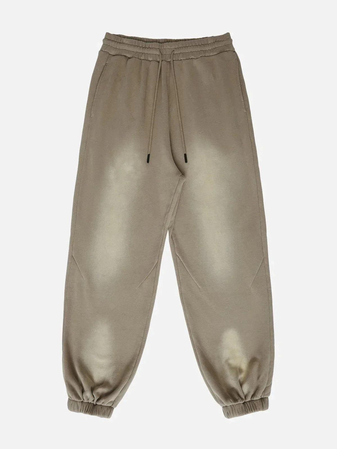 Khaki vintage smudged feet pants by TALISHKO, front view highlighting casual street style.