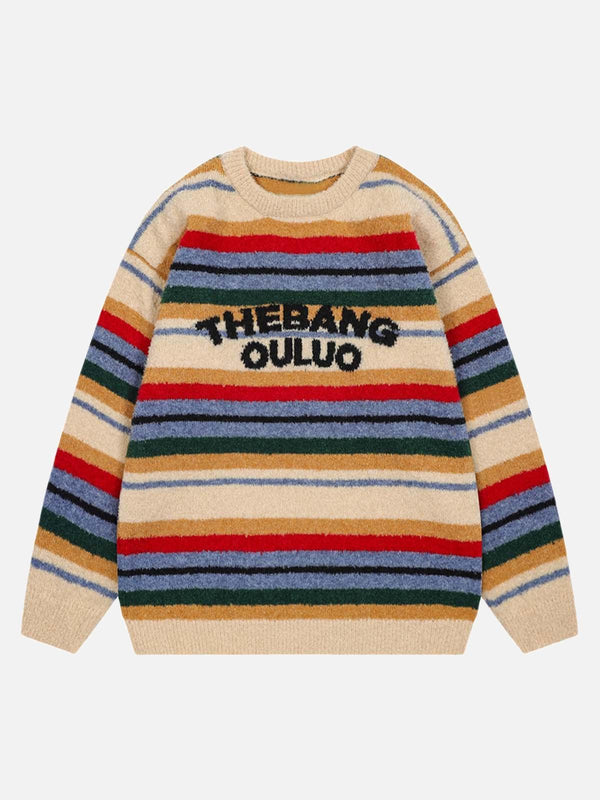 A cozy vintage striped sweater in beige, featuring bold lettering by TALISHKO, front view.