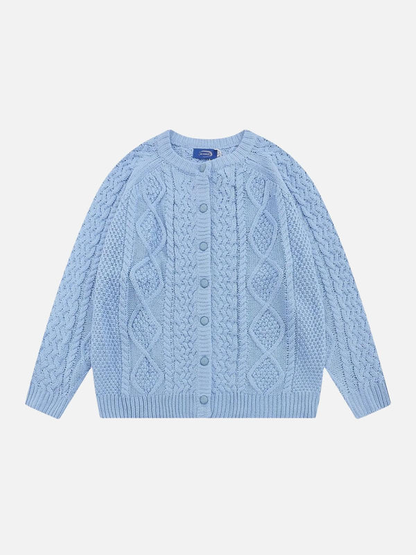 Front view of a blue vintage twist cardigan by TALISHKO, featuring intricate cable knit.