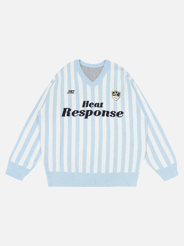 Front view of a blue vintage striped V-neck sweater by TALISHKO, showcasing preppy style.
