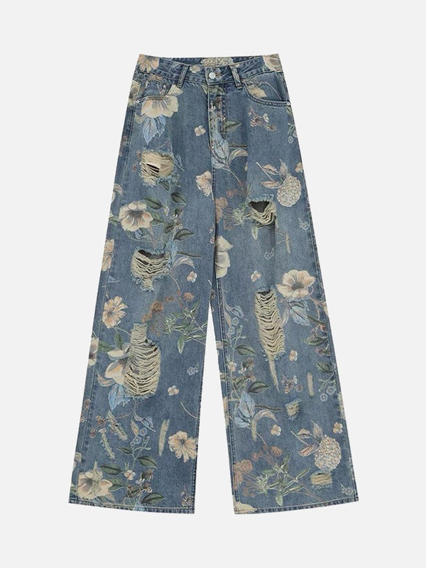 Front view of TALISHKO blue floral ripped baggy jeans with vintage washed texture.