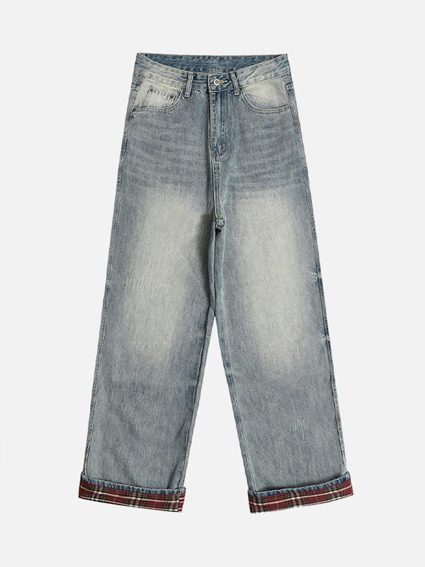 Front view of TALISHKO blue vintage washed baggy jeans with plaid cuffs, perfect for casual style.