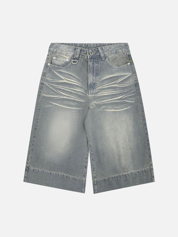 Front view of blue washed denim hip-hop shorts by TALISHKO, featuring a stylish faded design.