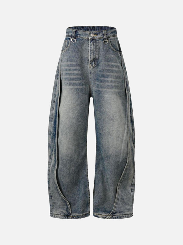 Front view of TALISHKO's blue deconstructed barrel jeans, featuring a washed distressed look.