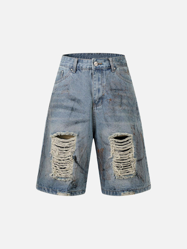 Front view of blue TALISHKO ripped denim shorts with distressed detailing and a dirty-dyed finish.