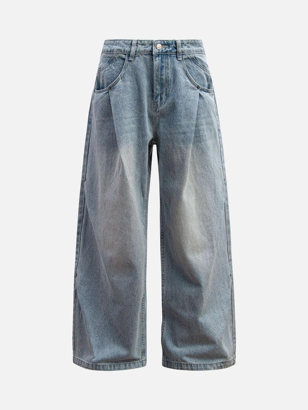 Front view of light blue washed distressed jeans with double pleats by TALISHKO, ideal for casual wear.