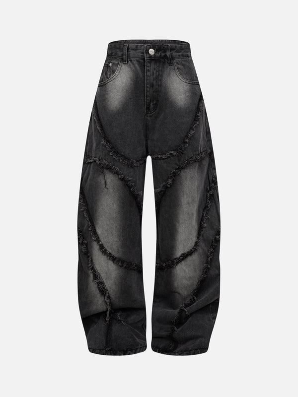 Dark gray barrel jeans by TALISHKO, front view with raw edge details and distressed texture.