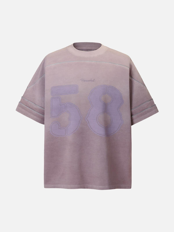 Front view of pink purple washed jersey T-shirt by TALISHKO with welt stitching and number 58.