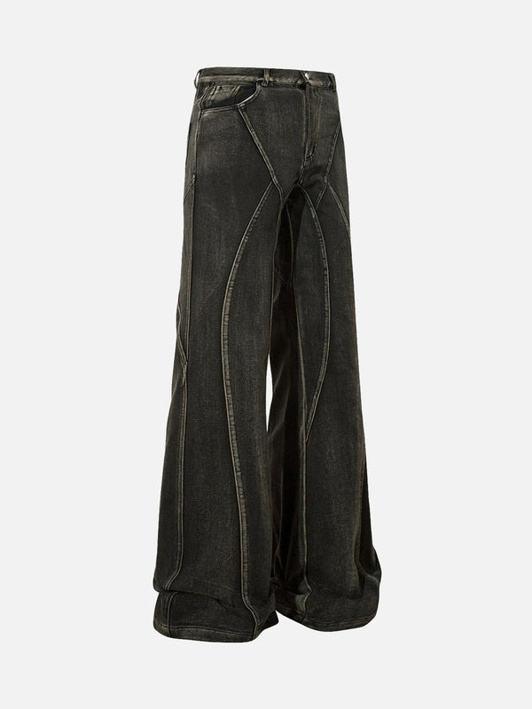Black washed hip-hop horn jeans by TALISHKO, showcasing unique split design from the front.