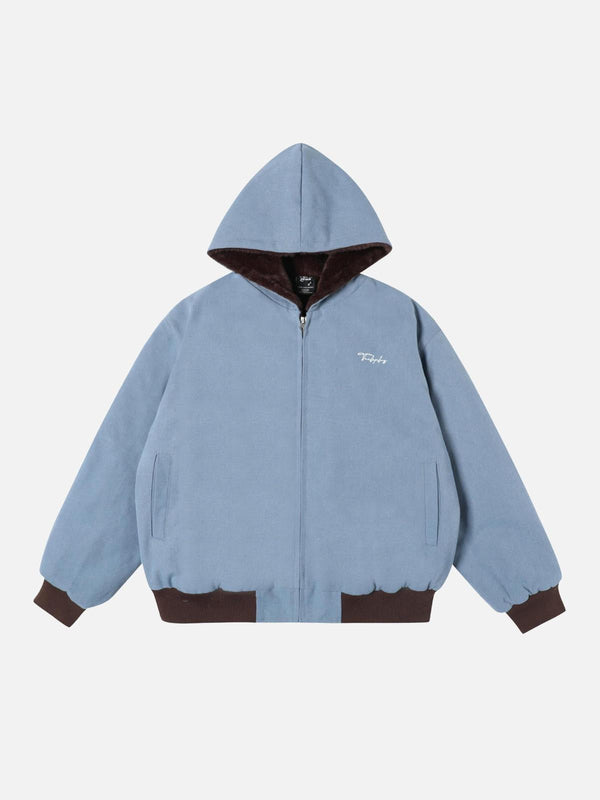 Front view of a blue washed zip-up hooded jacket by TALISHKO, perfect for urban style.